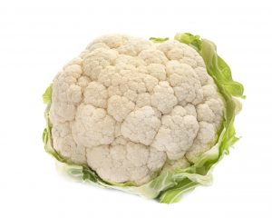 fresh cauliflower in front of white background